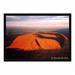 Uluru - or Ayres Rock - viewed from the air at sunset. Northern Territories, Australia